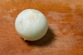 Sliced white onion on the board during the preparation of meals. Protection against the flu and colds.