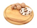 Sliced and whole chestnut mushrooms on a wooden cutting board Royalty Free Stock Photo