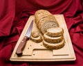 Sliced whole grain bread on wood