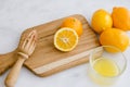 Juicing Meyer Lemons with a Citrus Reamer Royalty Free Stock Photo