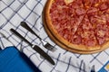 sliced whole salami pizza. Royalty Free Stock Photo