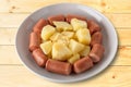 Sliced wurstel and boiled potatoes with mayonnaise Royalty Free Stock Photo