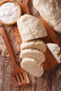 Sliced yeast knodel close-up on the table. vertical top view