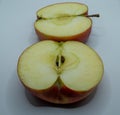 sliced ??yellow apple fruit with visible seeds and insides