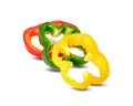 Sliced yellow green red bell pepper on white background Royalty Free Stock Photo