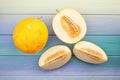 Sliced yellow melon on wood Royalty Free Stock Photo