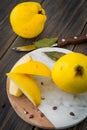 Sliced yellow quince or queen apple autumn fruits with seeds Royalty Free Stock Photo