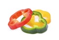 Sliced yellow,red,green, sweet bell pepper or capsicum isolated Royalty Free Stock Photo