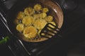 Sliced zucchini cooked in oil in a pan. fried pumpkin recipe Royalty Free Stock Photo