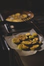 Sliced zucchini cooked in oil in a pan. fried pumpkin recipe Royalty Free Stock Photo