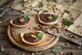 Slices of bread with chocolate cream nuts and knife. Royalty Free Stock Photo