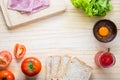 slices of bread with jam and ham, tamoto, lettuce, egg Royalty Free Stock Photo