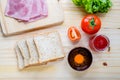 slices of bread with jam and ham, tamoto, lettuce, egg Royalty Free Stock Photo