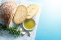 Slices of bread with rosemary, garlic and olive oil. Royalty Free Stock Photo