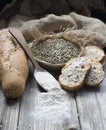 Slices of bread with rye seeds and flour Royalty Free Stock Photo