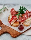 Slices of bread with spanish serrano ham Royalty Free Stock Photo