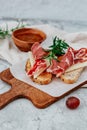 Slices of bread with spanish serrano ham Royalty Free Stock Photo