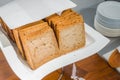 Slices of bread on table in buffet . Royalty Free Stock Photo