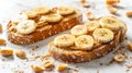 Two bread slices with banana and peanut butter Royalty Free Stock Photo