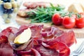 Slices of Bresaola on a plate