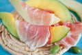 Slices of cantaloupe melon, ham and olives Royalty Free Stock Photo