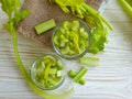 Slices of celery on wooden diet veggie background cooking veggie
