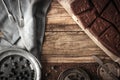 Slices of chocolate brownie with blueberry and vintage dinnerware horizontal