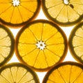 Slices of citrus fruit likely oranges and lemons displayed in overlapping Royalty Free Stock Photo