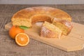 Slices of clementine cake with powdered sugar topping. Cake on a