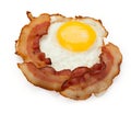 Slices of cooked bacon with fried egg isolated on a white background, close-up Royalty Free Stock Photo