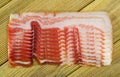 Slices of cured bacon