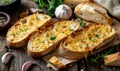 Slices of delicious garlic bread on rustic background Royalty Free Stock Photo