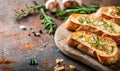 Slices of delicious garlic bread on rustic background Royalty Free Stock Photo