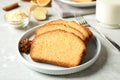 Slices of delicious gingerbread cake served on light grey table Royalty Free Stock Photo