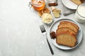 Slices of delicious gingerbread cake served with milk on light grey table, flat lay. Space for text Royalty Free Stock Photo