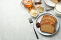Slices of delicious gingerbread cake served with milk on light grey table, flat lay. Space for text Royalty Free Stock Photo