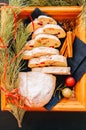 Slices of Dresden Stollen with dried cranberies and nuts. Festive European dessert. Christmas baking concept. Top view. Royalty Free Stock Photo