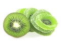 Slices of dried kiwi and fresh kiwi fruit isolated on white background. Dried candied kiwi fruit slices Royalty Free Stock Photo