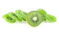 Slices of dried kiwi and fresh kiwi fruit isolated on white background. Dried candied kiwi fruit slices Royalty Free Stock Photo