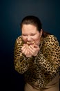 Slices of fast food in the hands of a fat girl. Not appetizing. The concept of gluttony. Overweight.