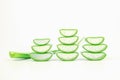 Slices of fresh aloe vera plant stacked and aloe vera stalk or leaves with water dropping