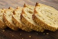 Slices of fresh baked corn bread on a cutting board close up Royalty Free Stock Photo