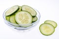 Slices of fresh cucumber in glass bowl. Royalty Free Stock Photo
