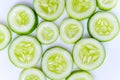 Slices of fresh green cucumber. isolated white background Royalty Free Stock Photo