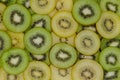 Slices of fresh green and yellow kiwi fruits Royalty Free Stock Photo