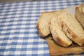 Slices of fresh homemade white yeast bread with flax seeds,