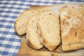 Slices of fresh homemade white yeast bread with flax seeds,