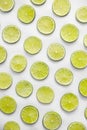 Slices of fresh juicy limes on white background Royalty Free Stock Photo