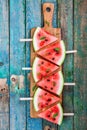 Slices of fresh juicy watermelon on a cutting board Royalty Free Stock Photo