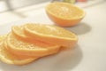 Slices of freshly cutted orange for backgrounds Royalty Free Stock Photo